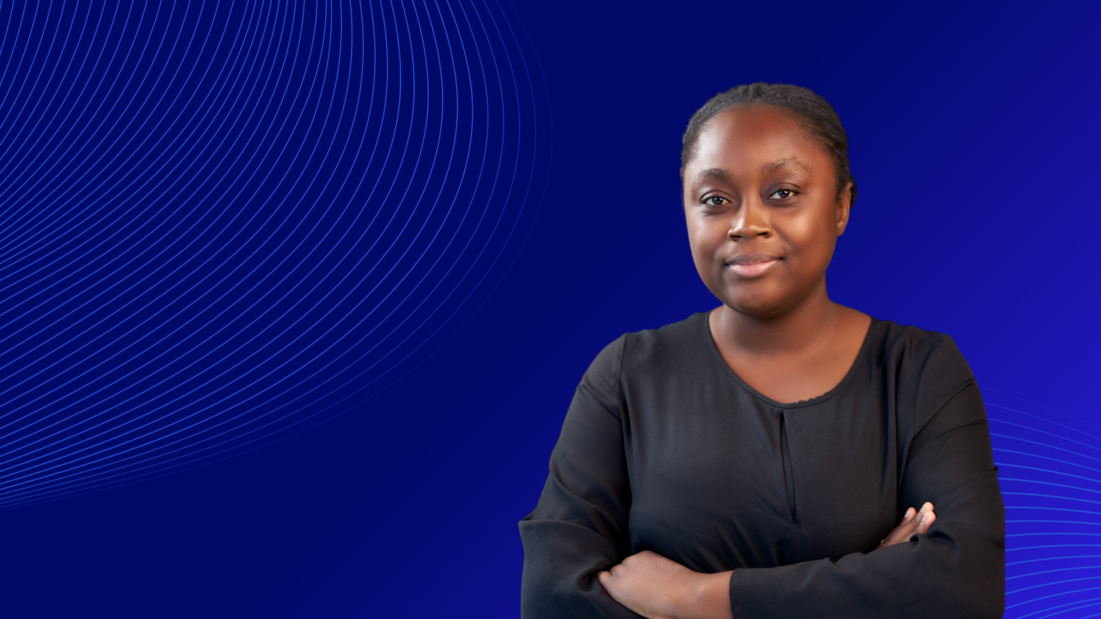 Portrait of a person wearing a black long-sleeved top, standing with folded arms and looking at the camera with a slight smile. The background is a dark blue graphic with curved, light-blue line patterns in the top left and bottom right corners, leaving ample negative space on the left for text.