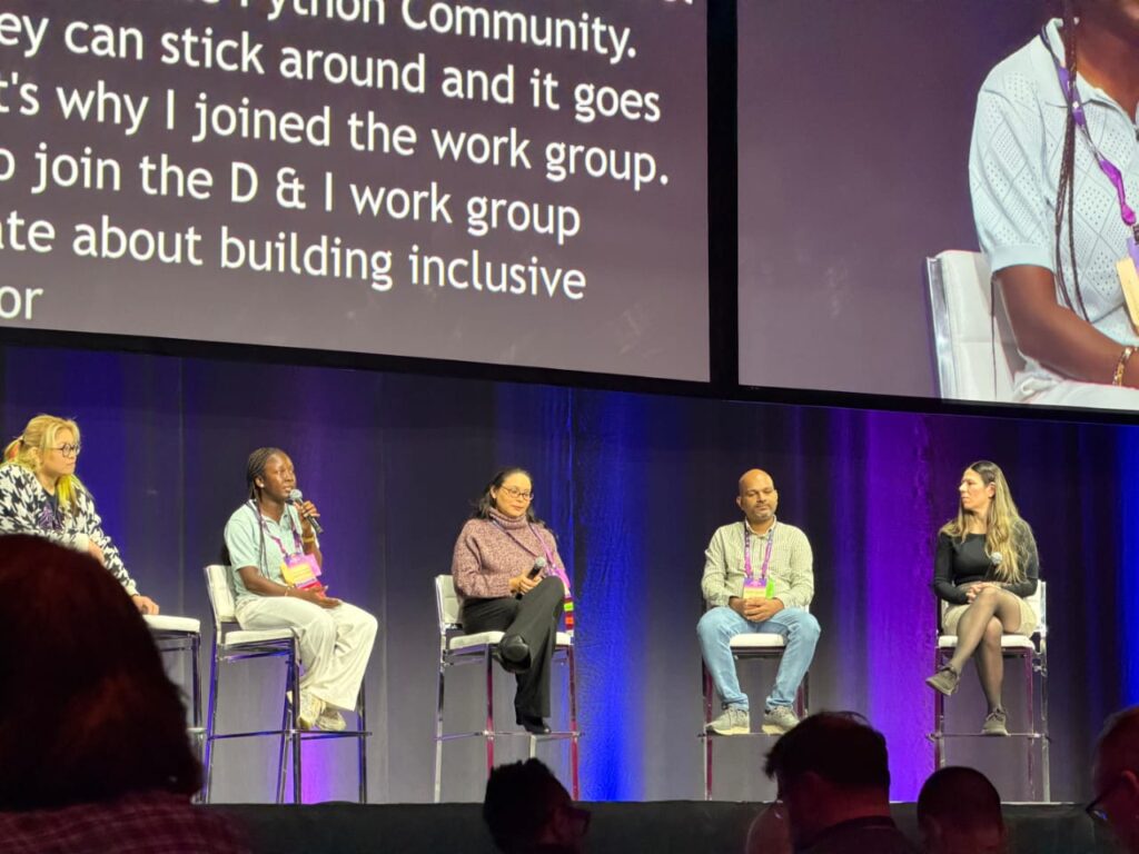 Theresa Seyram Agbenyegah speaking alongside four other panellists at the PyCon US 2026 Diversity and Inclusion panel.
